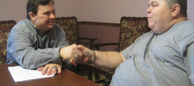Mark Shaking Hands