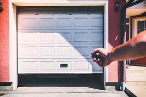 Garage Door Replacement — Contractors repair garage door panel replacement in Mount Pleasant, TN Garage Door Replacement — Contractors repair garage door panel replacement in Mount Pleasant, TN