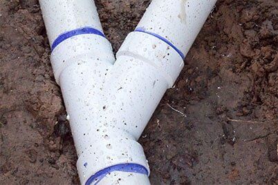 New sewer pipe in dirt — Drain & Sewer Line Cleaning in Michigan