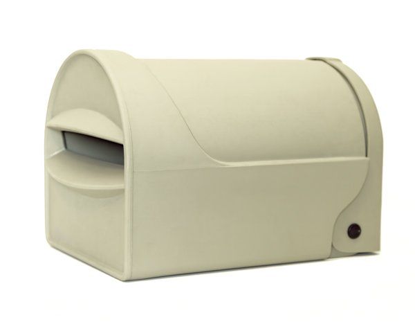 A beige, residential mailbox with a front-facing mail slot on a white background. Tuffies unbreakable range NZ and Australia.
