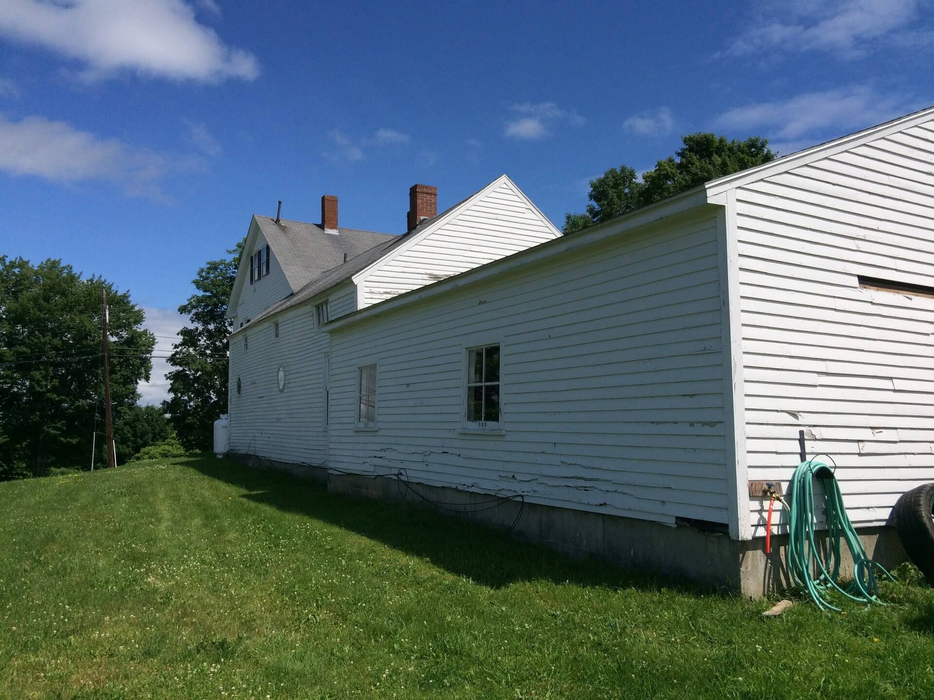 Home in Auburn, ME With Damaged Siding