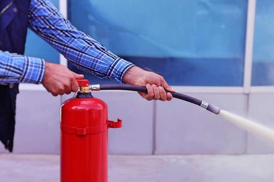 Extinguisher Demonstration — East-West Fire Services In Garbutt, QLD