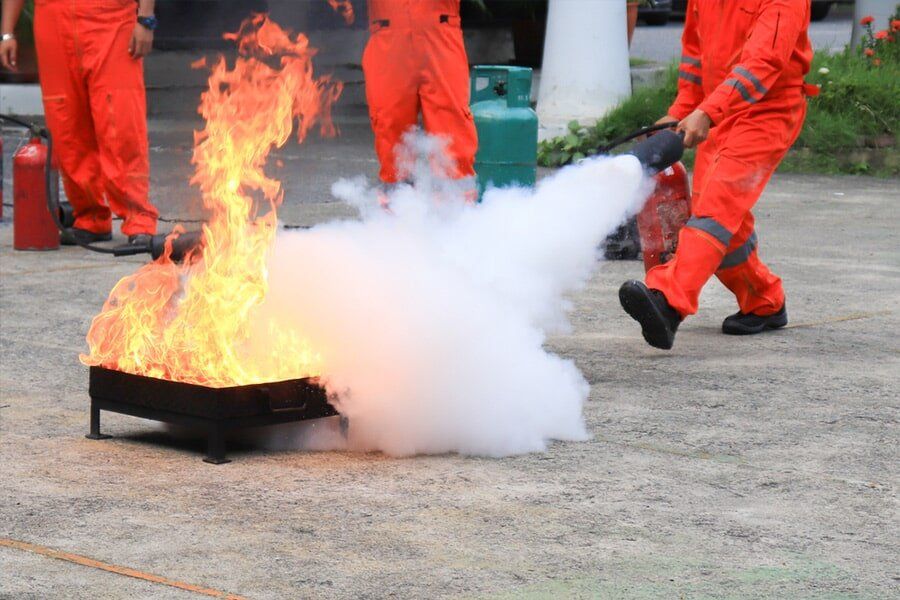 Fire Extinguisher Demonstration — East-West Fire Services In Garbutt, QLD