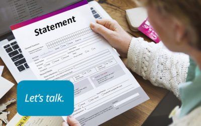 Woman Looking at the Statement Form — Newberg, OR — Chehalem Insurance Associates