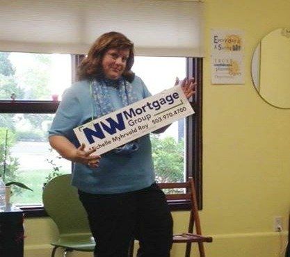 Woman Holding a Sign Board — Newberg, OR — Chehalem Insurance Associates Woman Holding a Sign Board — Newberg, OR — Chehalem Insurance Associates