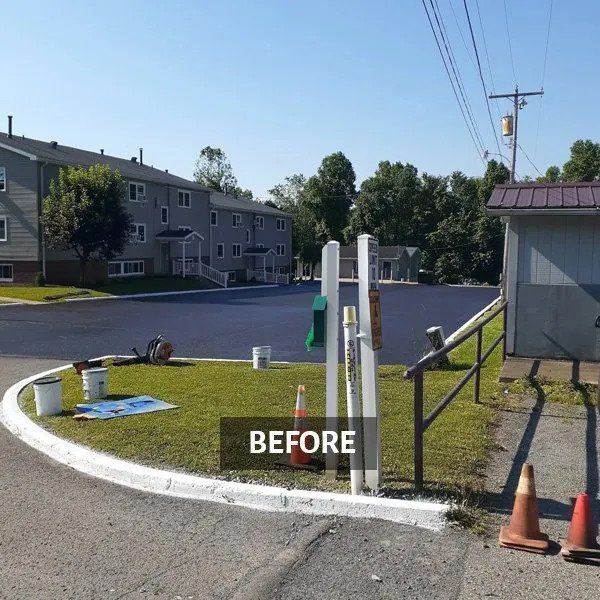 residential parking lot before line striping, line striping company near me, milan pa