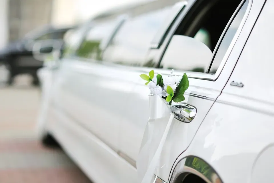 Limousine With Wedding Car Decoration — Ceres, CA — Luxury Limousine