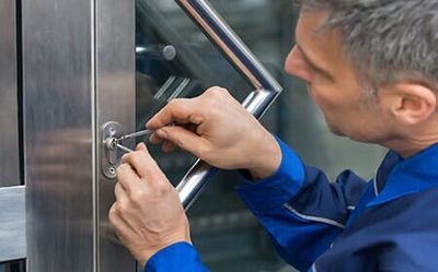 Locksmith lock picking a door — Locksmith in Des Moines, IA