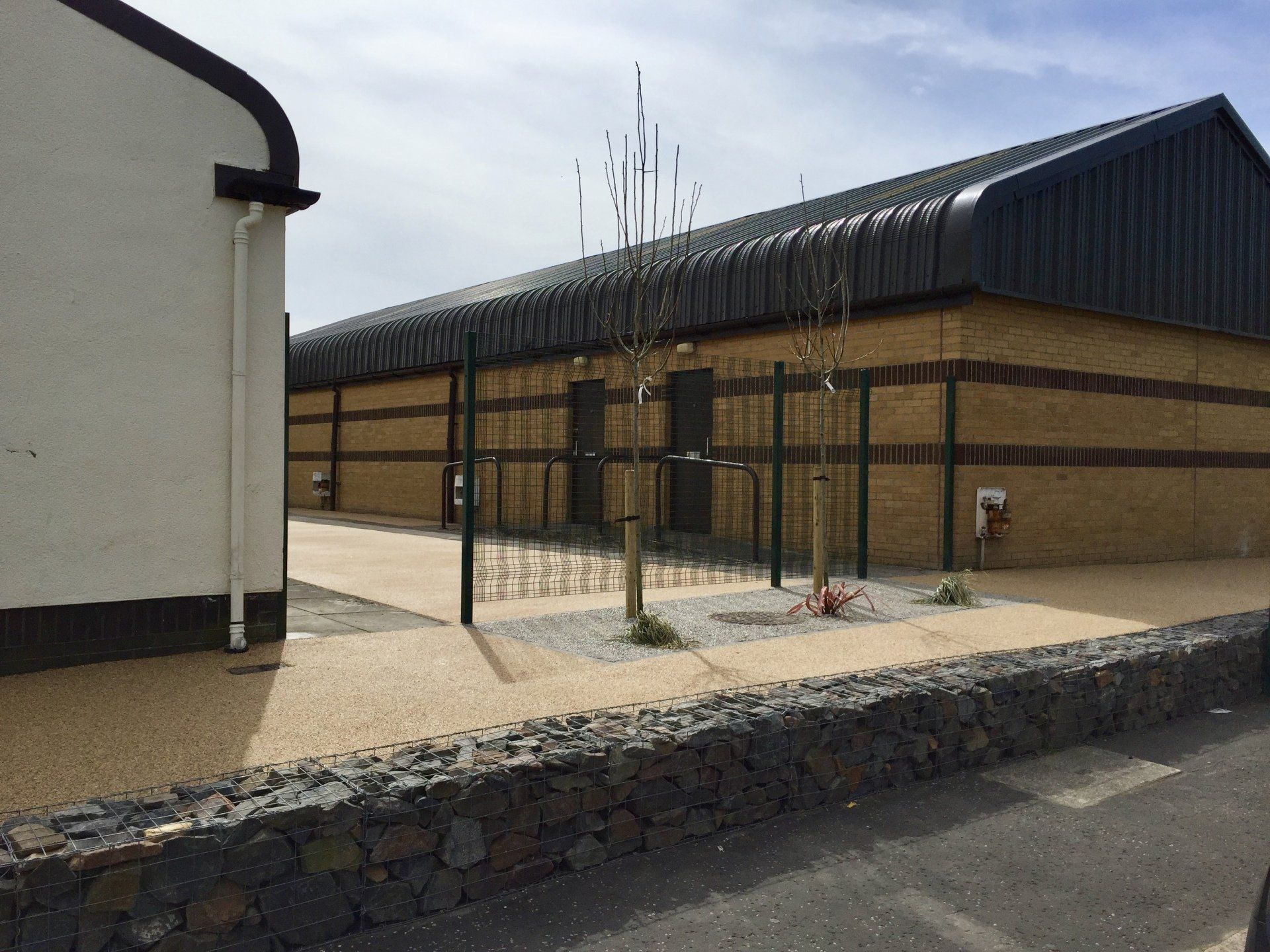 Low maintenance solutions to overgrown industrial units Landscaping to industrial units