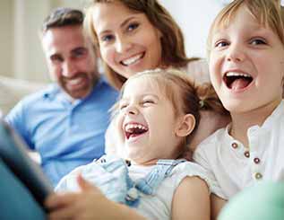 Happy Family - Dental Office in Northglenn, CO Happy Family - Dental Office in Northglenn, CO