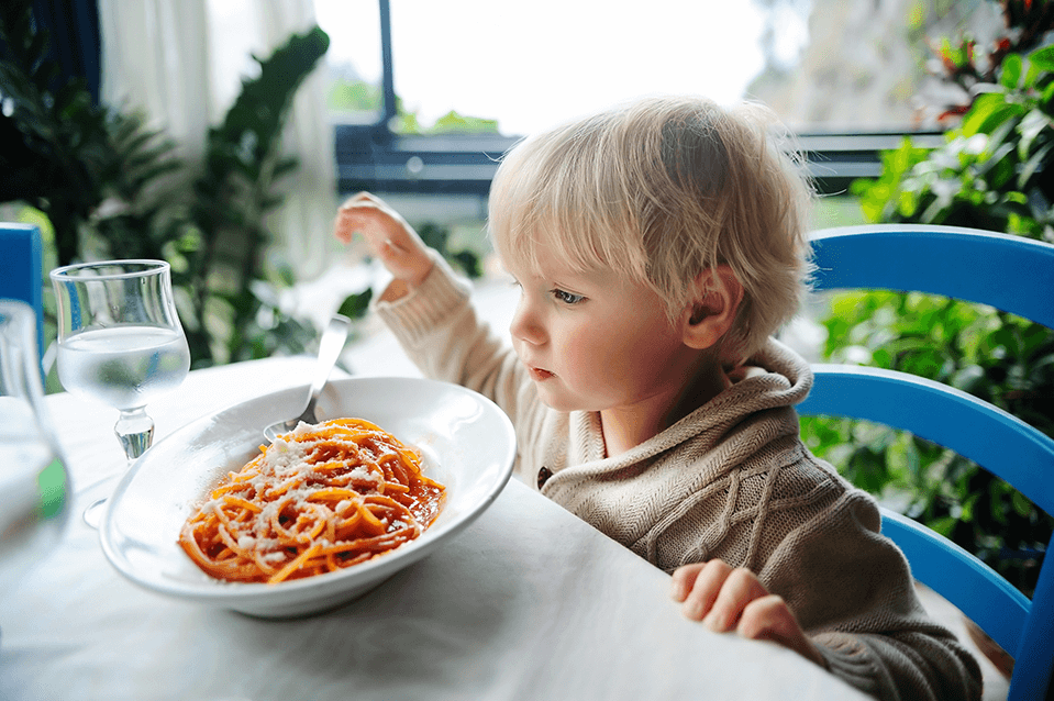 Child eating spaghetti