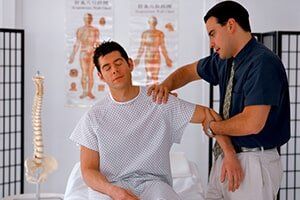 Doctor Treating Patient — Therapy in Oshkosh, WI