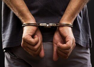 Arrested man handcuffed—Appeal Bonds in Bowling Green, VA Arrested man handcuffed—Appeal Bonds in Bowling Green, VA
