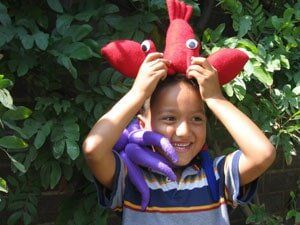 Boy holding a toy — Children's Center in Lakewood,, CA Boy holding a toy — Children's Center in Lakewood,, CA