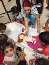 Children with Teacher — Children's Center in Lakewood,, CA Children with Teacher — Children's Center in Lakewood,, CA