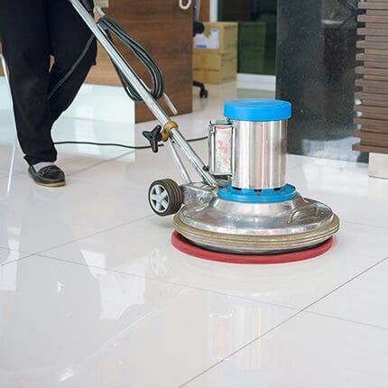 Worker Tiler Lays Tiles — House Cleaning in Washington, PA Worker Tiler Lays Tiles — House Cleaning in Washington, PA