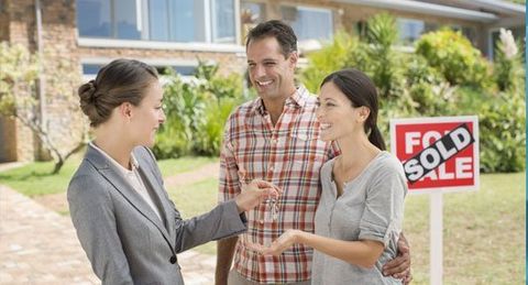 a couple after buying the house