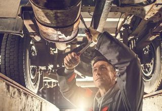 mechanic repairing the car