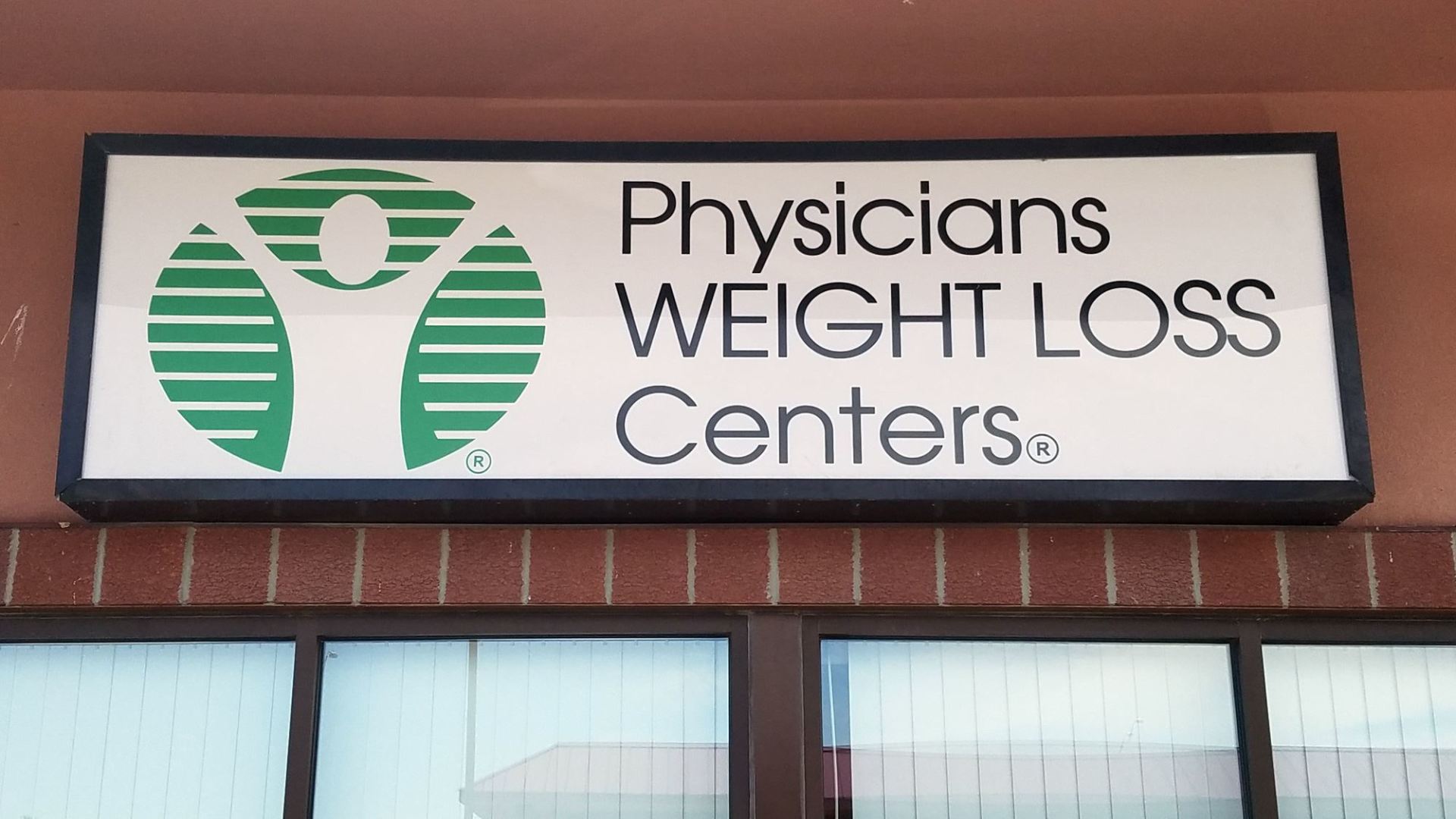 A sign for the physicians weight loss centers
