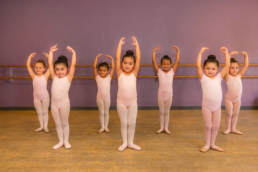 Little Girls Posing for a Ballet Picture