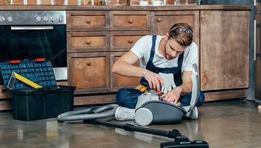 Vacuum Repairs — Professional Repairman Fixing Vacuum Cleaner in Riverside, CA Vacuum Repairs — Professional Repairman Fixing Vacuum Cleaner in Riverside, CA