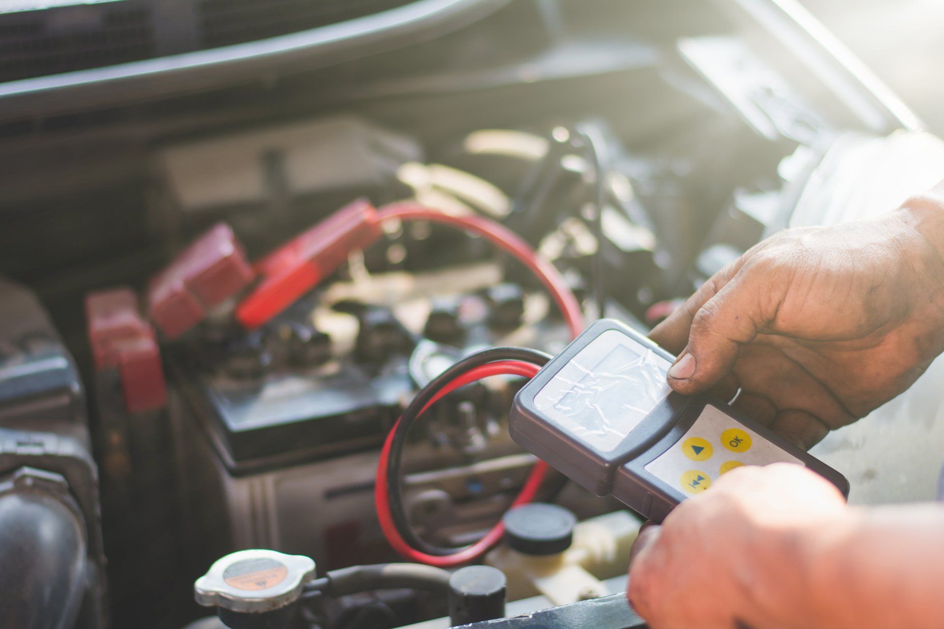 mechanic diagnosing the engine