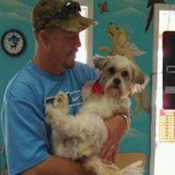 Man Carrying Her Dog | Lenoir, NC | All God's Creatures Great & Small