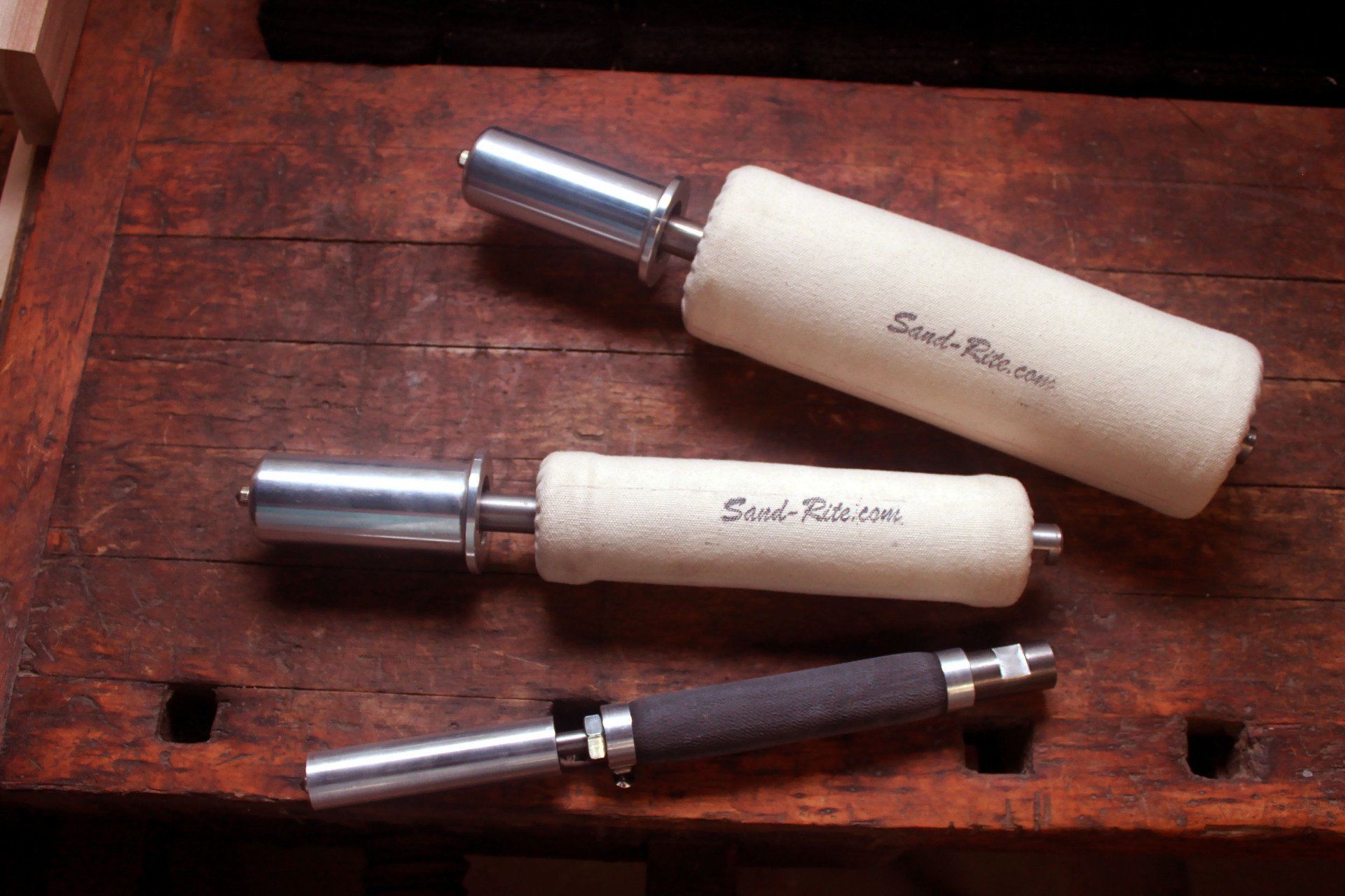 Sand-Rite production quality hand held pump drum sanders