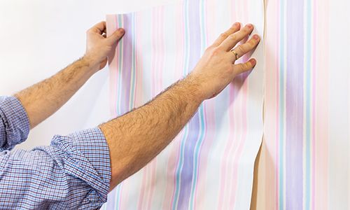 Professional installing wallcover in Kula, HI