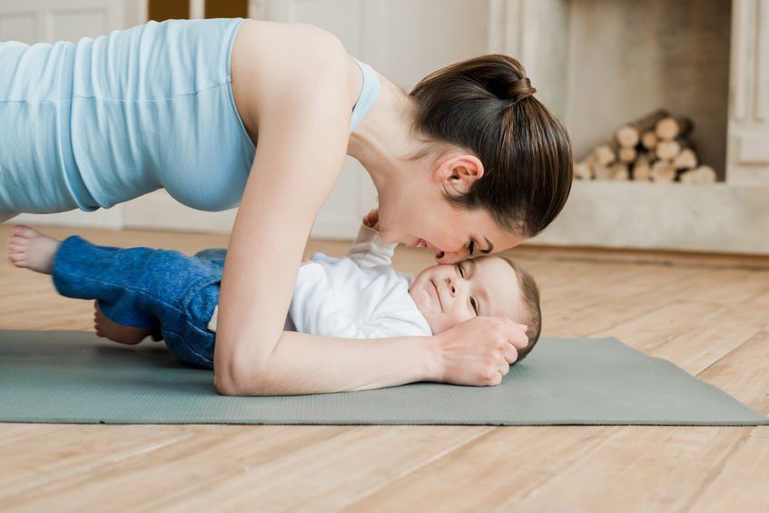 Mom working out with her baby