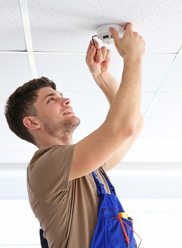 Smoke Alarm Installation, White Ceiling — Electrician in Newtown, QLD Smoke Alarm Installation, White Ceiling — Electrician in Newtown, QLD