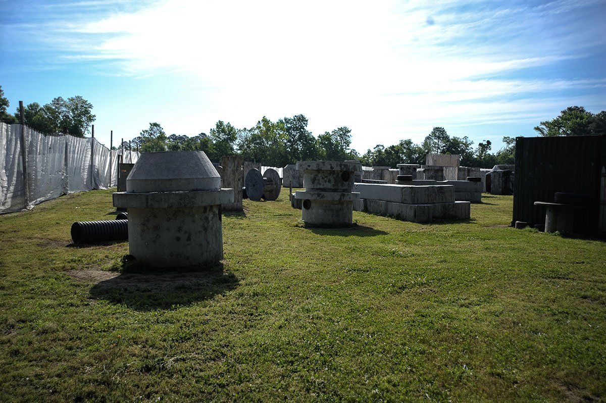 A field with a lot of concrete blocks in it