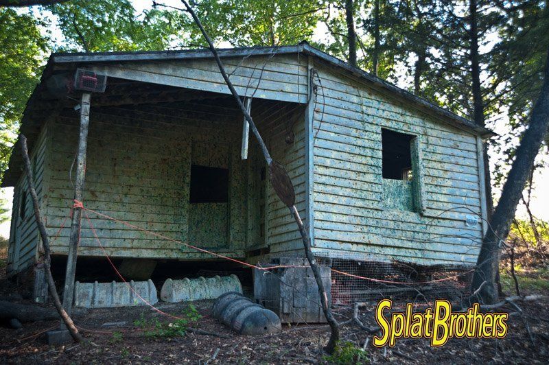 An old house with the words splat brothers on the bottom