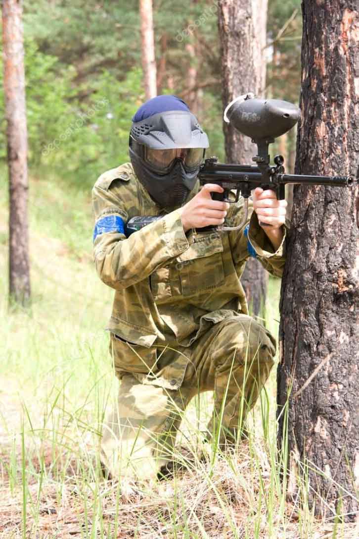 Player at Let's Play Paintball Park Man playing woodsball at Let's Play