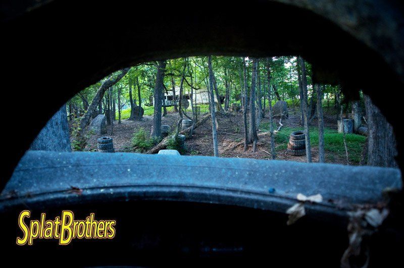 A picture of a paintball field with the words splatbrothers on the bottom