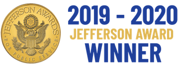 Gold Jefferson Award medallion with blue text: 
