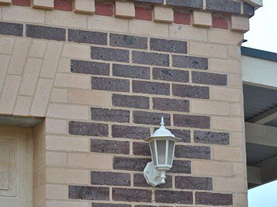 multi coloured detailed brick with light