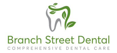 Logo for Branch Street Dental: tooth with green leaves, above green text.