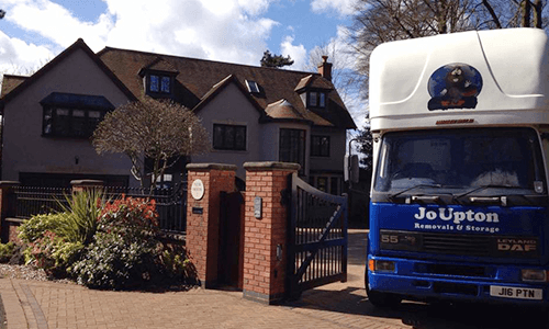 Van moving out of a house