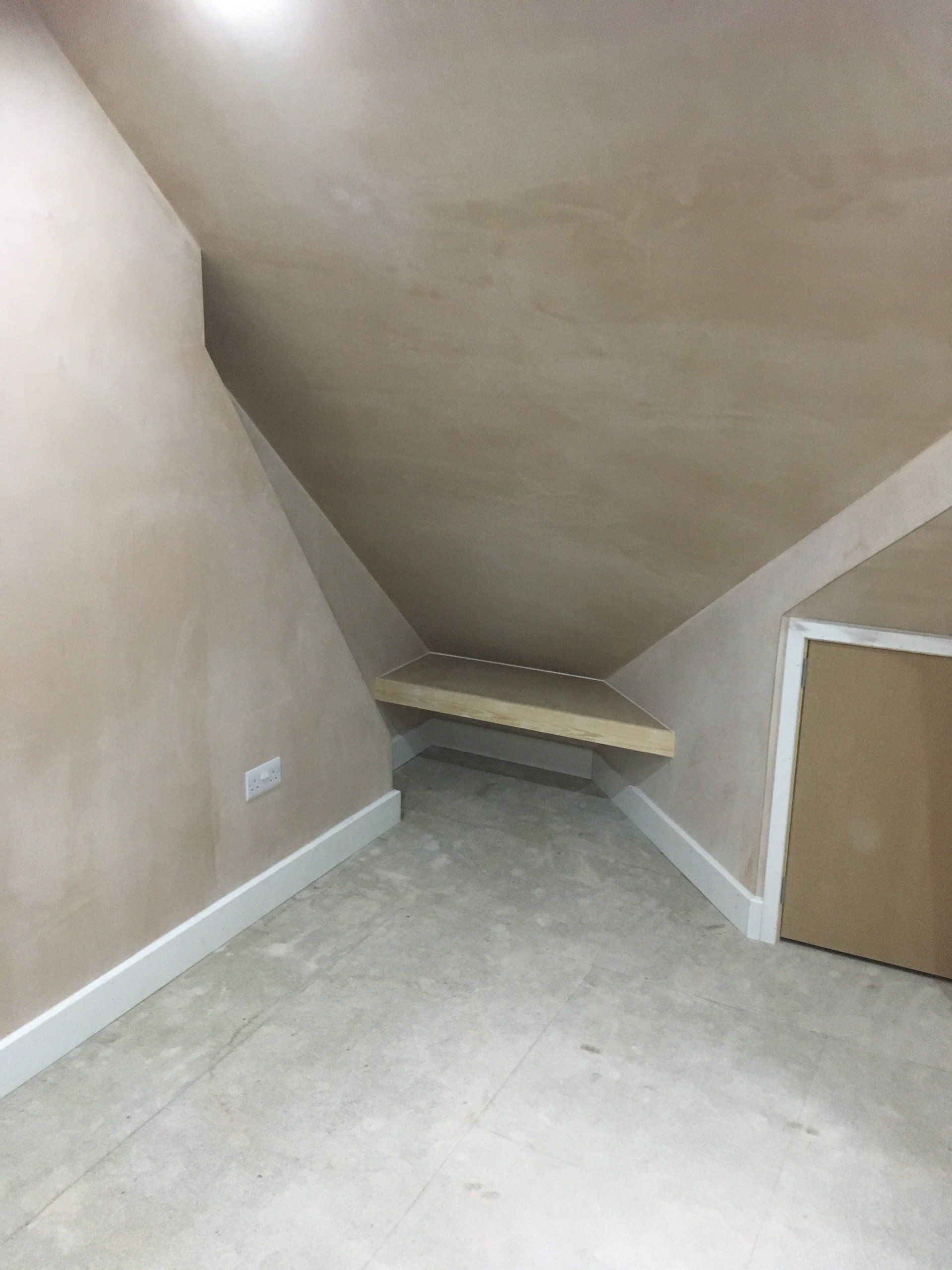 A newly converted and plastered loft or attic space
