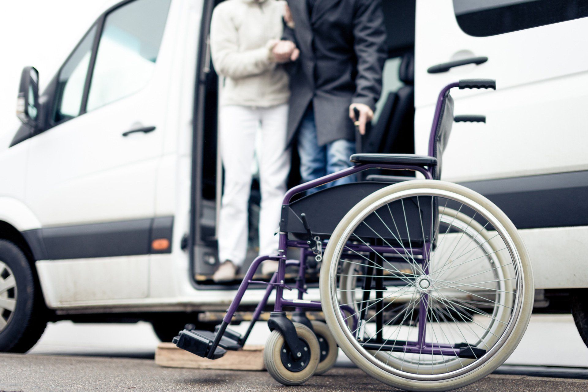 Transportation Assistance — Nurse Helping Senior Man Exit A Van in Marco Island, FL