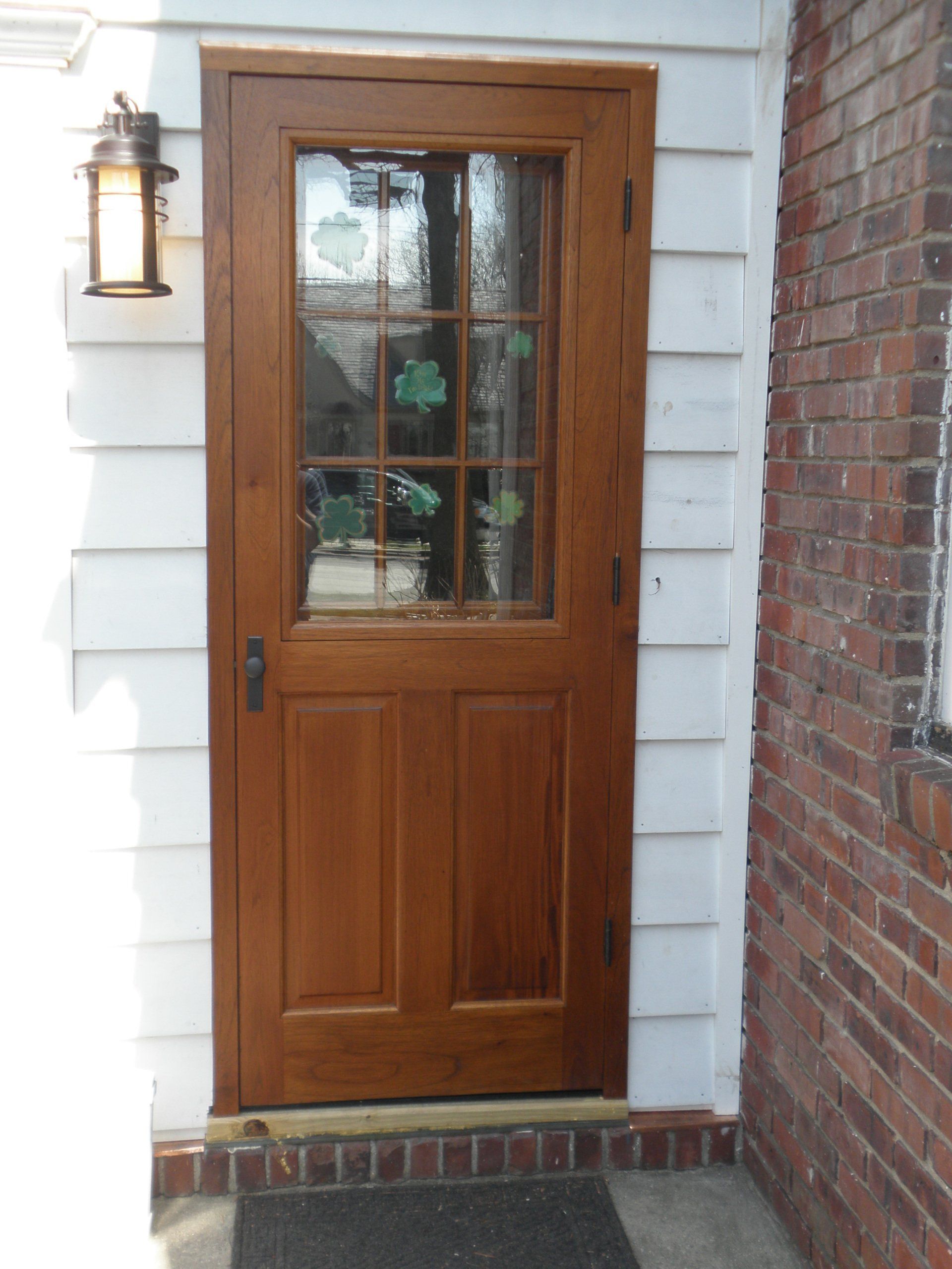 COLONIAL WITH MAHOGANY STORM DOOR