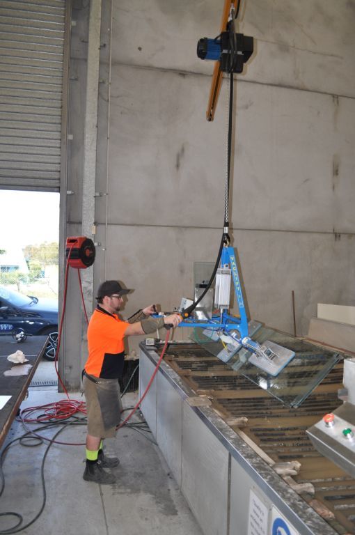 Lifting a heavy drum with one of our lifting solutions in New Zealand