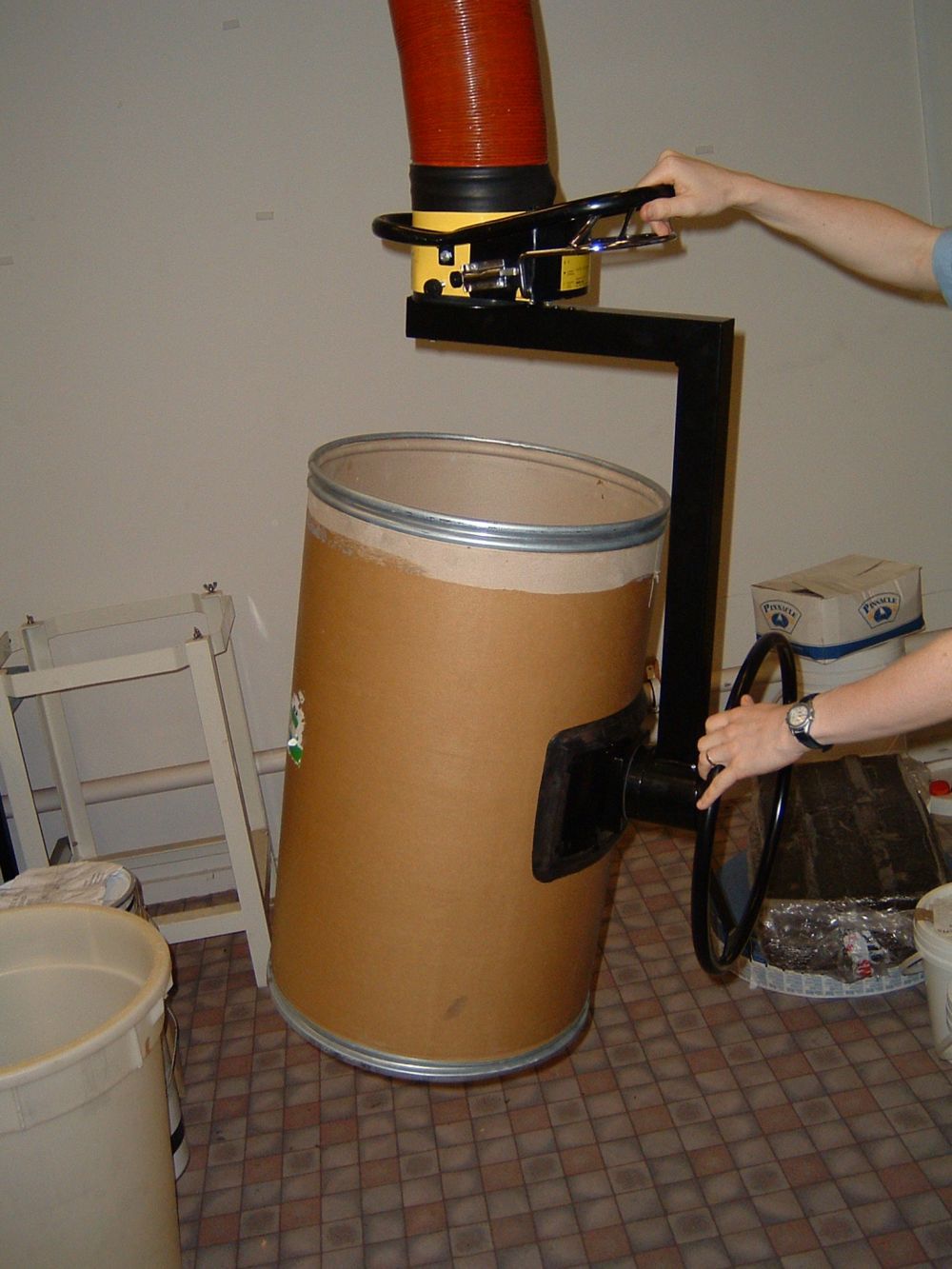 Lifting a heavy drum with one of our lifting solutions in New Zealand