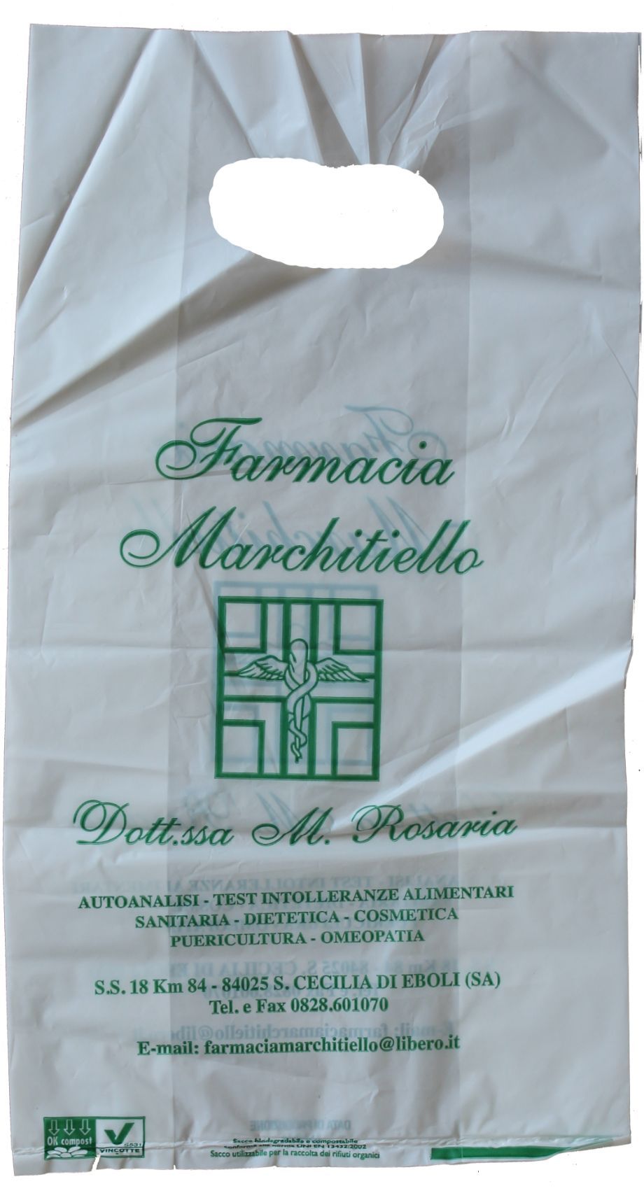 Un sacchetto di plastica bianco con la scritta farmacia sopra