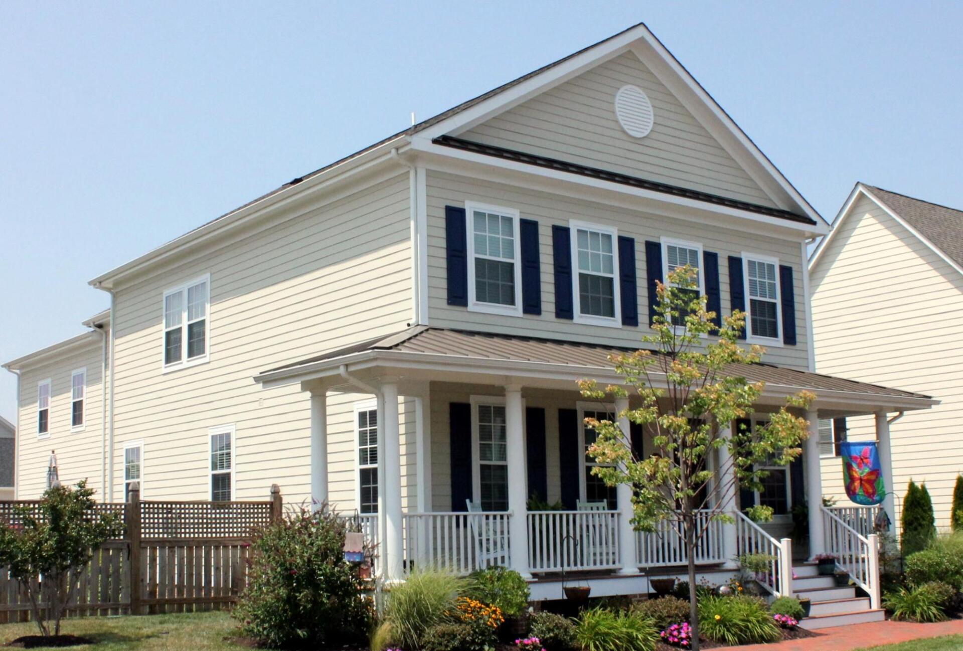 Yellow two story home with porch exterior | Port Royal Classic | Covell Communities | Chester, Maryland 21619