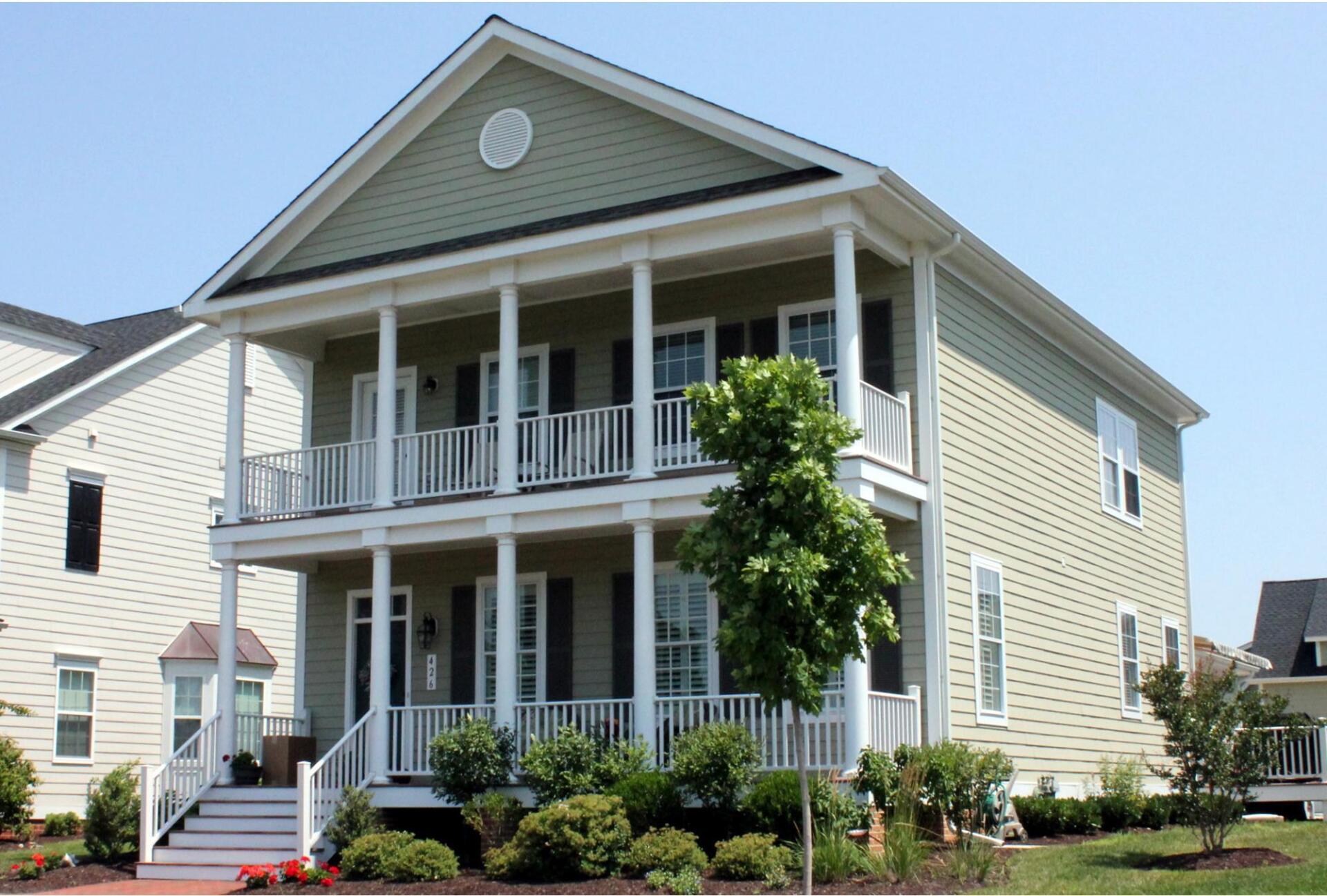 Yellow two story home with porch exterior | Port Royal Classic | Covell Communities | Chester, Maryland 21619
