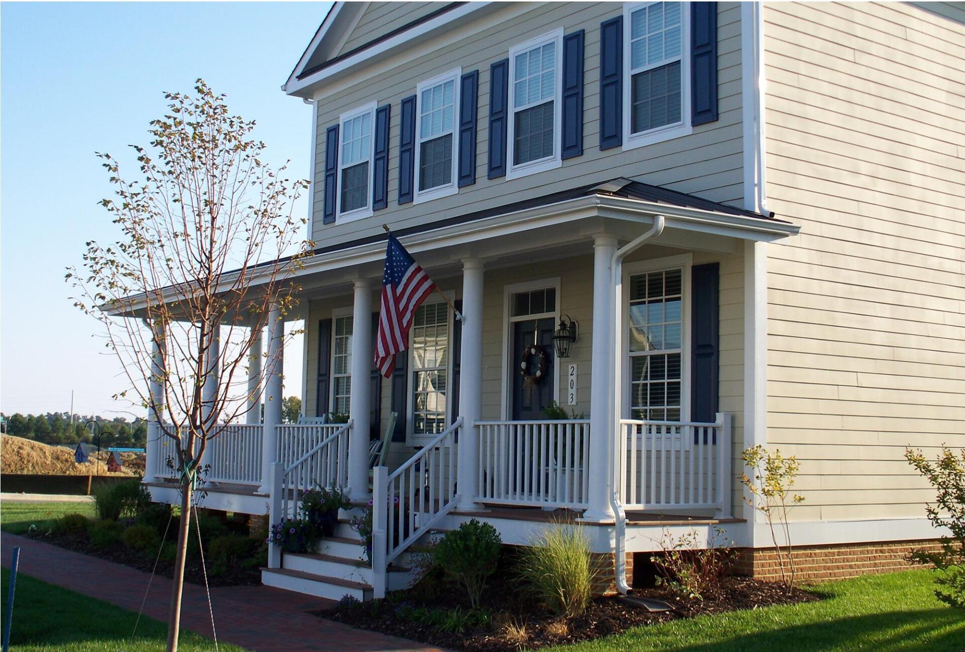 Yellow home with porch exterior | Port Royal Classic | Covell Communities | Chester, Maryland 21619