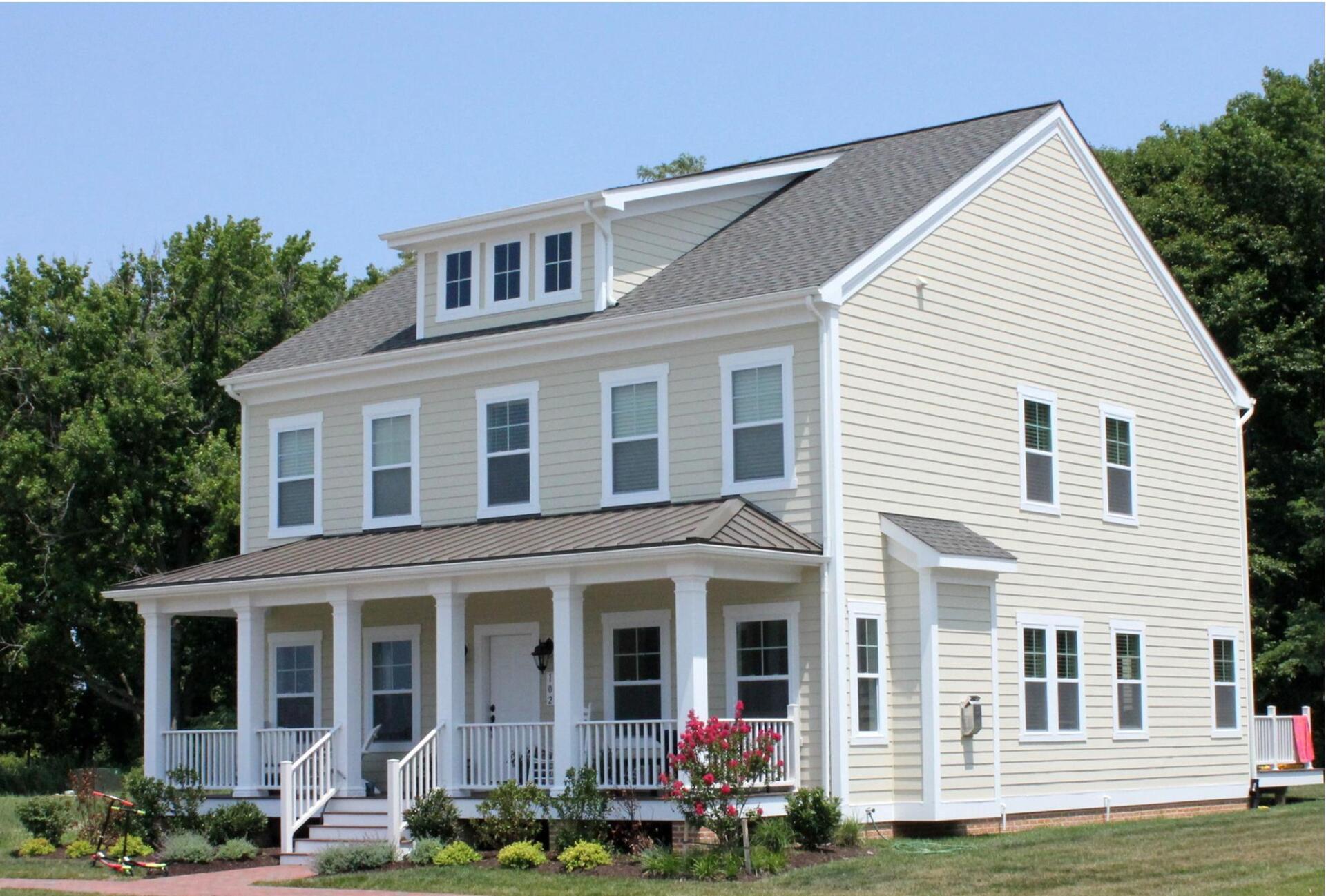 Two story cream colored home exterior front | Covell Communities | Chester, Maryland 21619