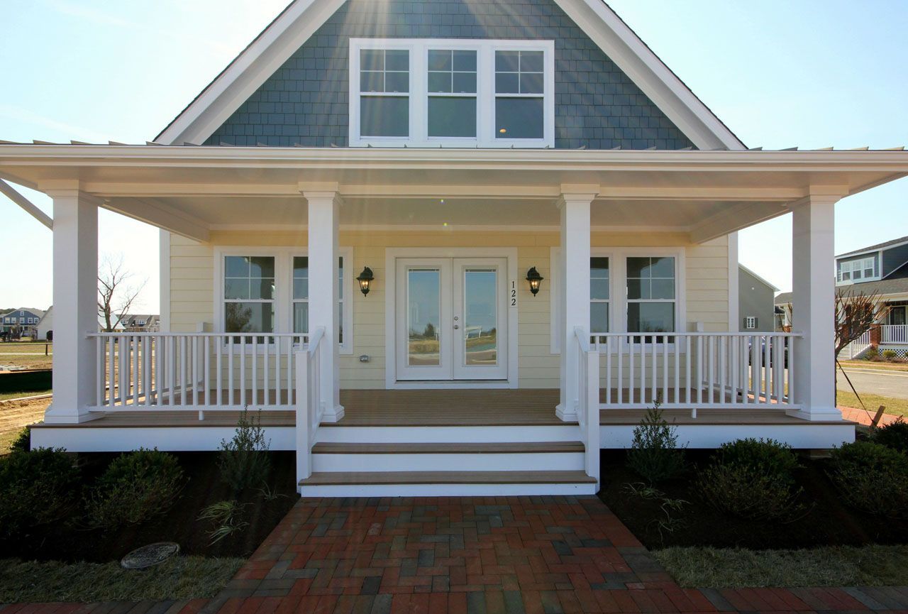 Yellow home exterior with porch | Sawgrass Legacy | Covell Communities | Chester, Maryland 21619